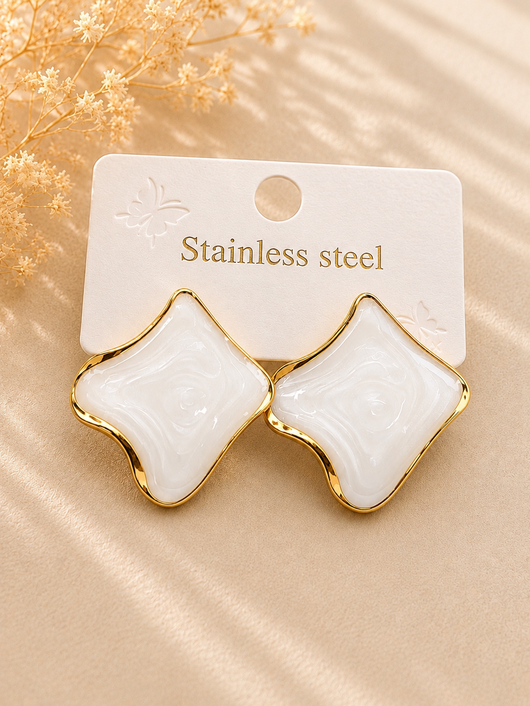 Ivory Wave Statement Stud Earrings