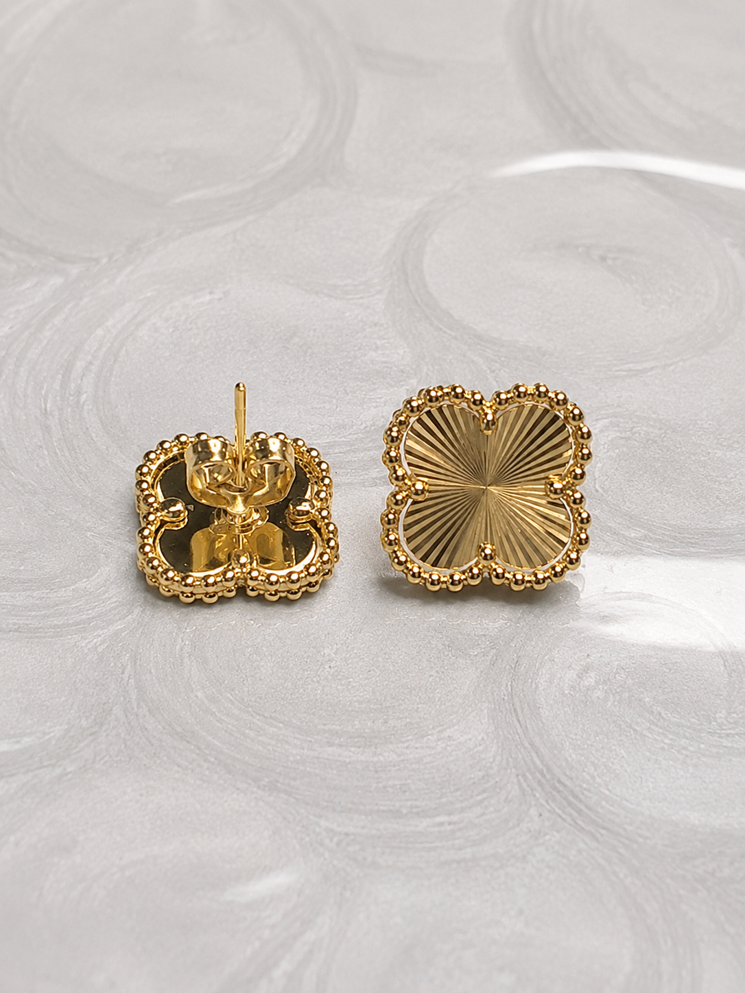 Radiant Four-Petal Stud Earrings