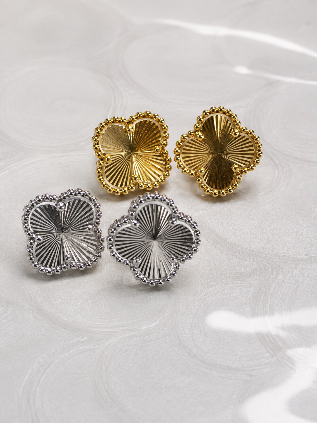 Radiant Four-Petal Stud Earrings