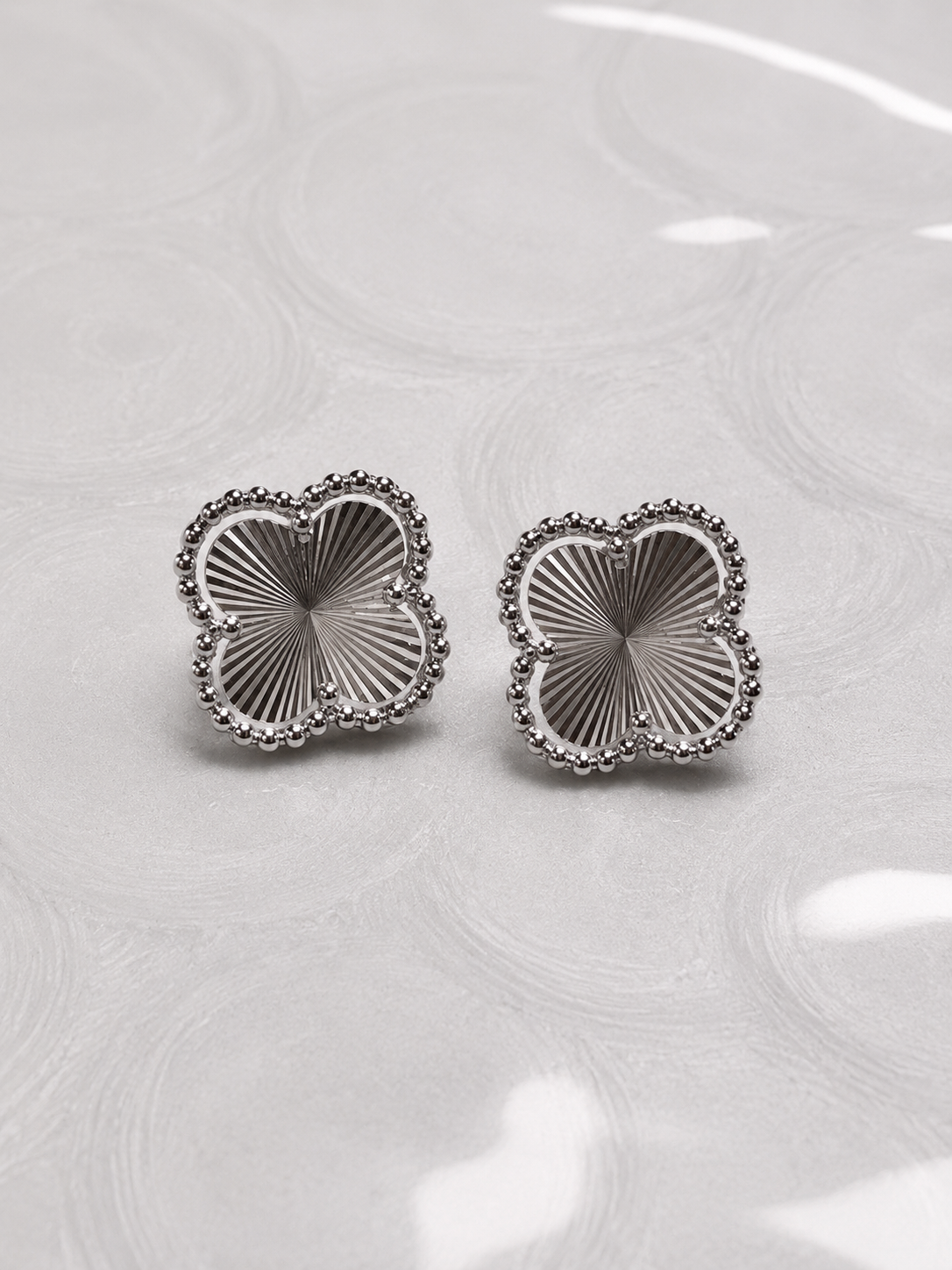 Radiant Four-Petal Stud Earrings